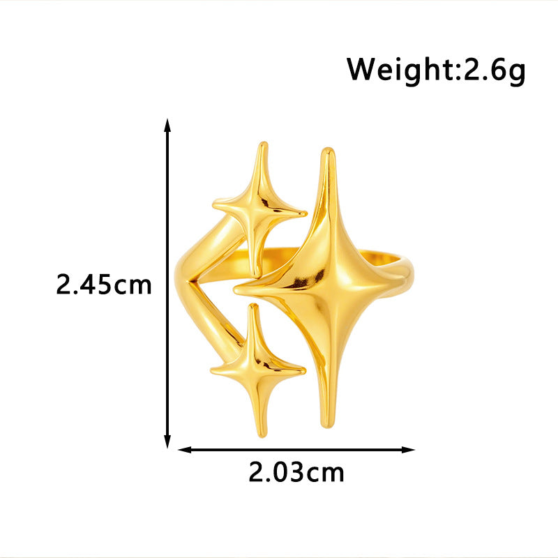Gold star ring with maker chart marking 2.45 by 2.03 cm and 2.6 grams