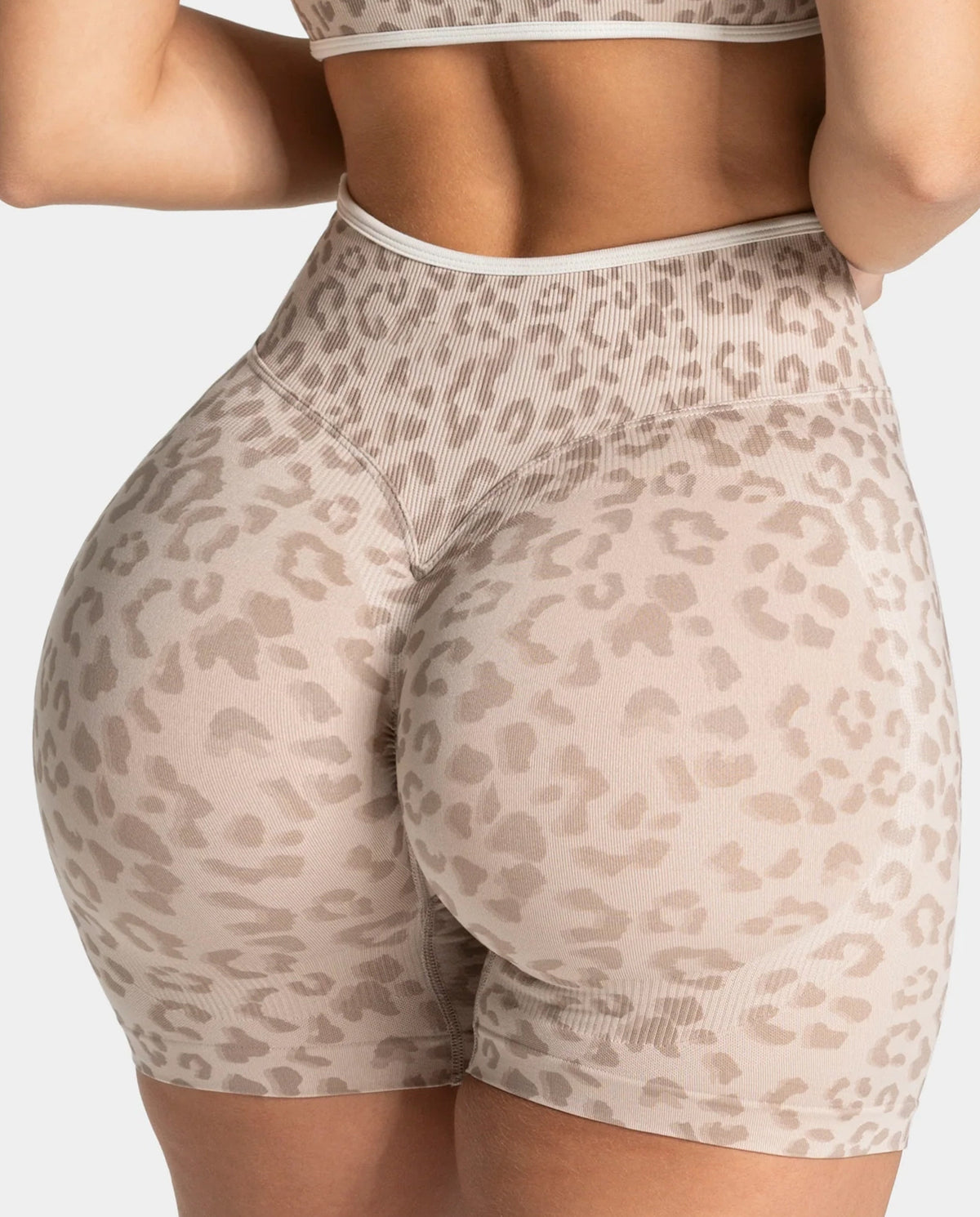Beige seamless high waist yoga shorts with a 3D leopard print and ribbed waistband, size S variant image