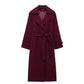 Double breasted belted longline woollen look overcoat, styled open over a knit and trousers