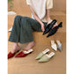 Pointed toe leather mules shown in black, cream white, red, silver and creamy yellow