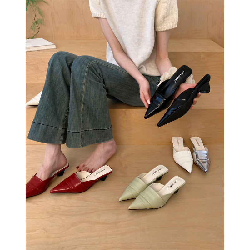 Pointed toe leather mules shown in black, cream white, red, silver and creamy yellow