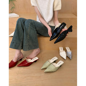 Pointed toe leather mules shown in black, cream white, red, silver and creamy yellow