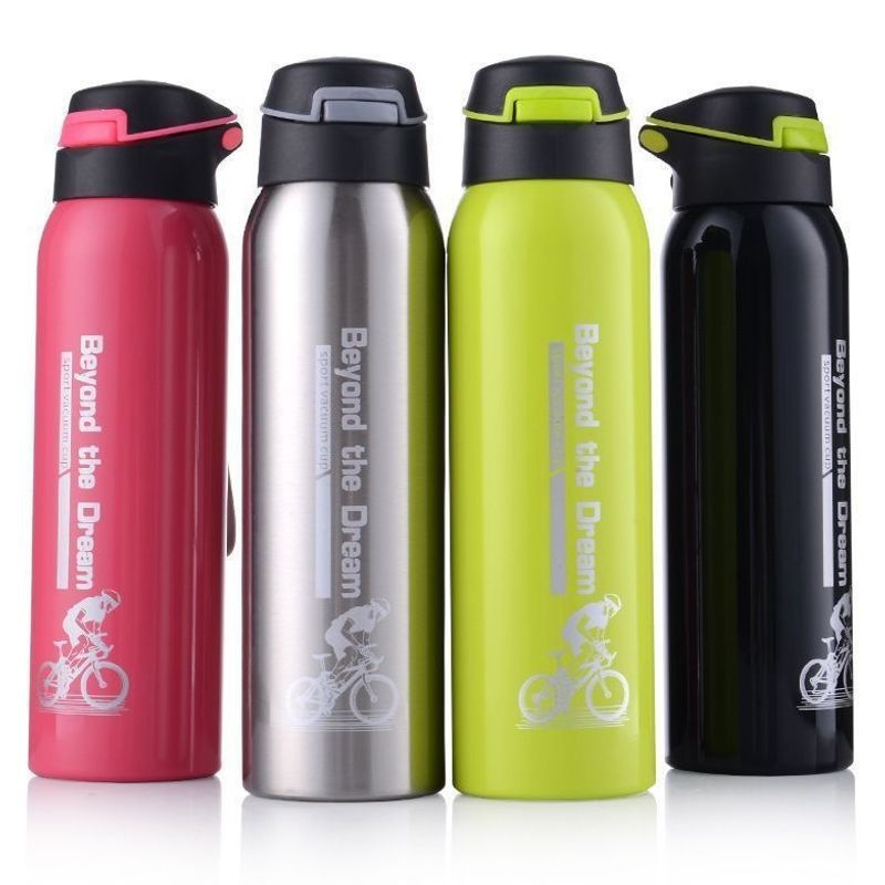 Line up of pink, silver, apple green and black stainless steel sports bottles with black flip lids on white