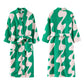 Green and pale pink wavy print fleece robe laid flat, front and back views with a belt, on a white background