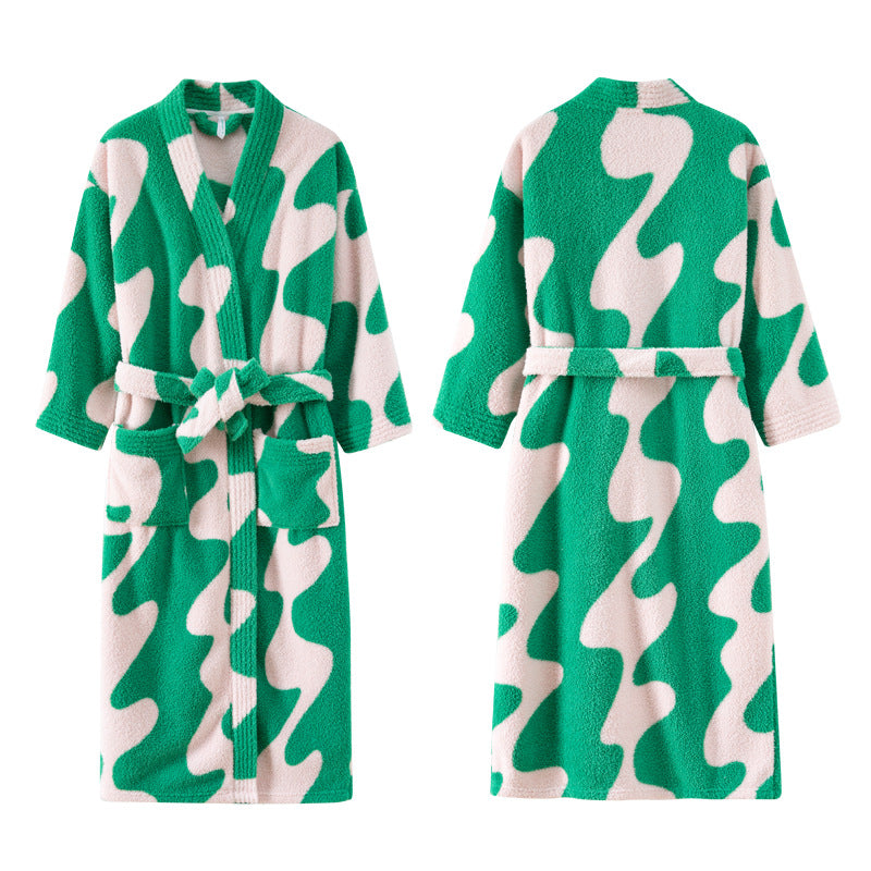 Green and pale pink wavy print fleece robe laid flat, front and back views with a belt, on a white background