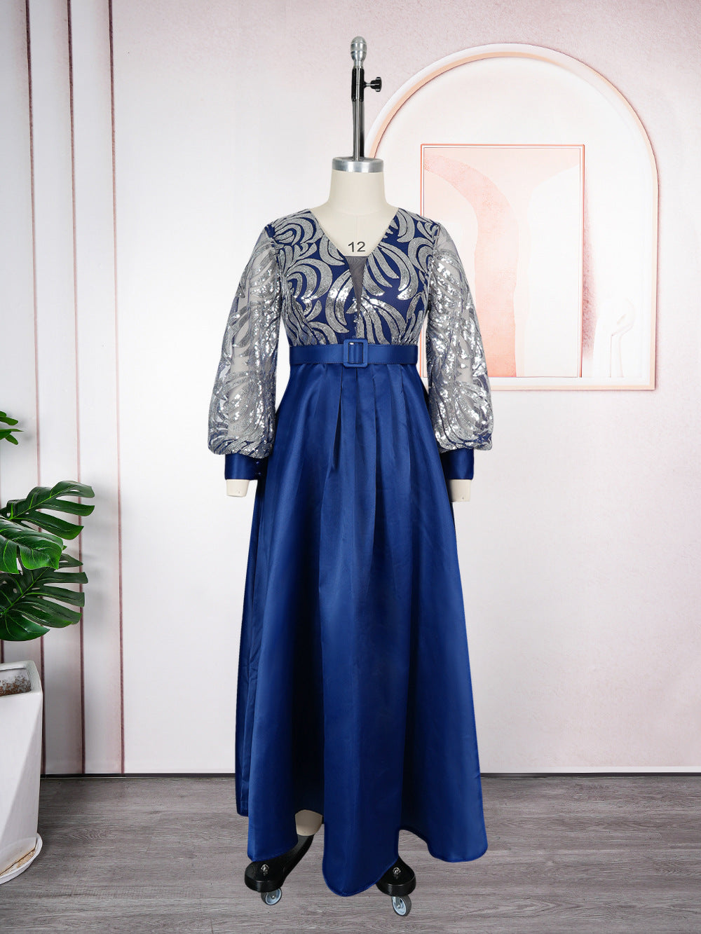 Blue maxi dress with silver sequin mesh bodice and matching belt on a dress form, Blue option