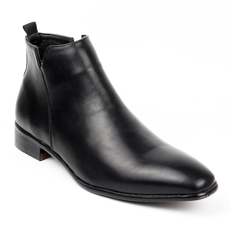 Single black square toe ankle boot with a side seam, a low heel and a heel pull tab on white