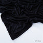 Corner of the modal cotton headscarf wrap showing the neat rolled hem and flat solid color