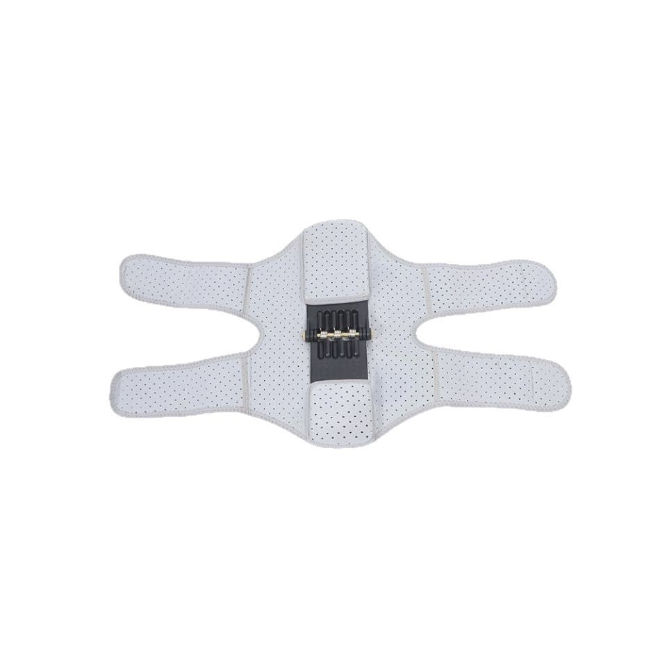 Flat lay of the grey perforated knee wrap showing the black coil spring panel