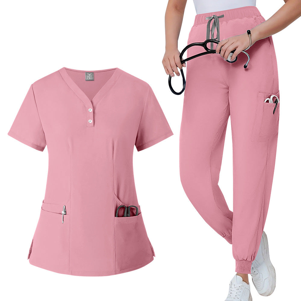 Close view of the shaped side seam on the womens scrub top