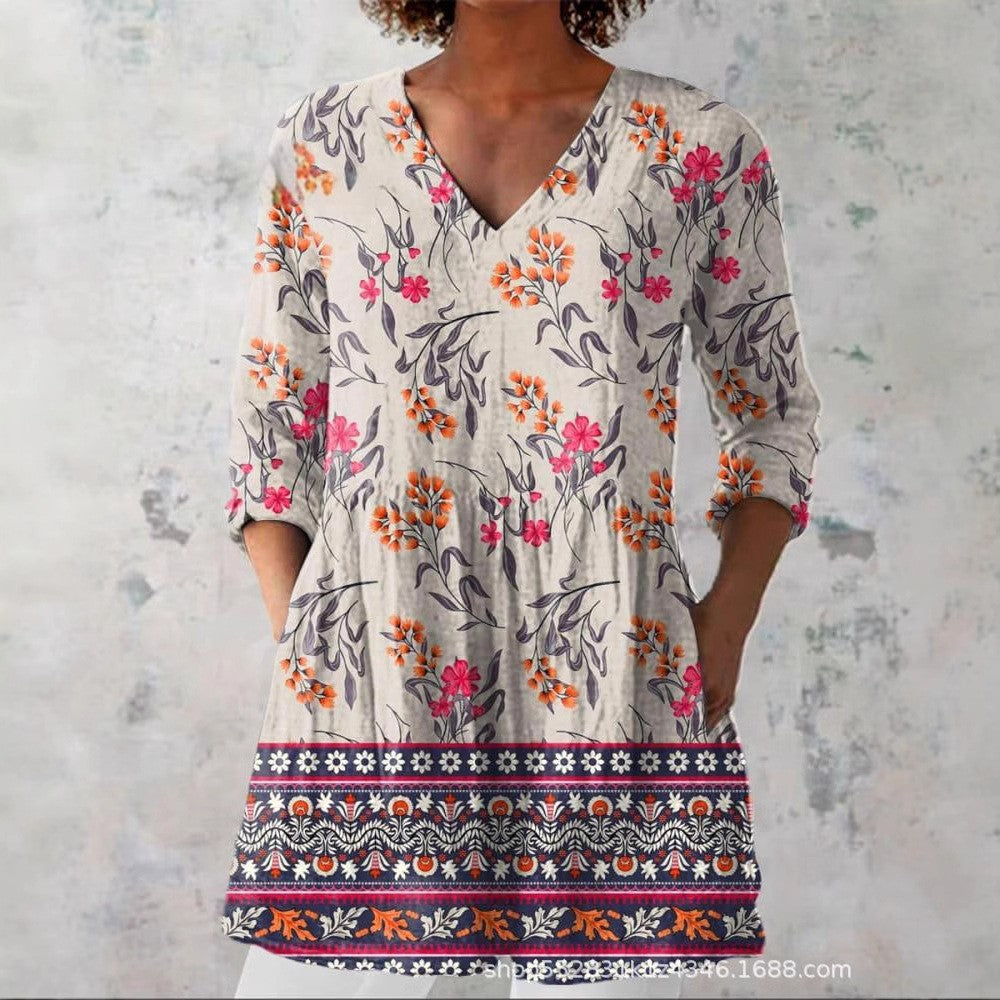Boho print V neck tunic top with hidden side seam pockets at the hip