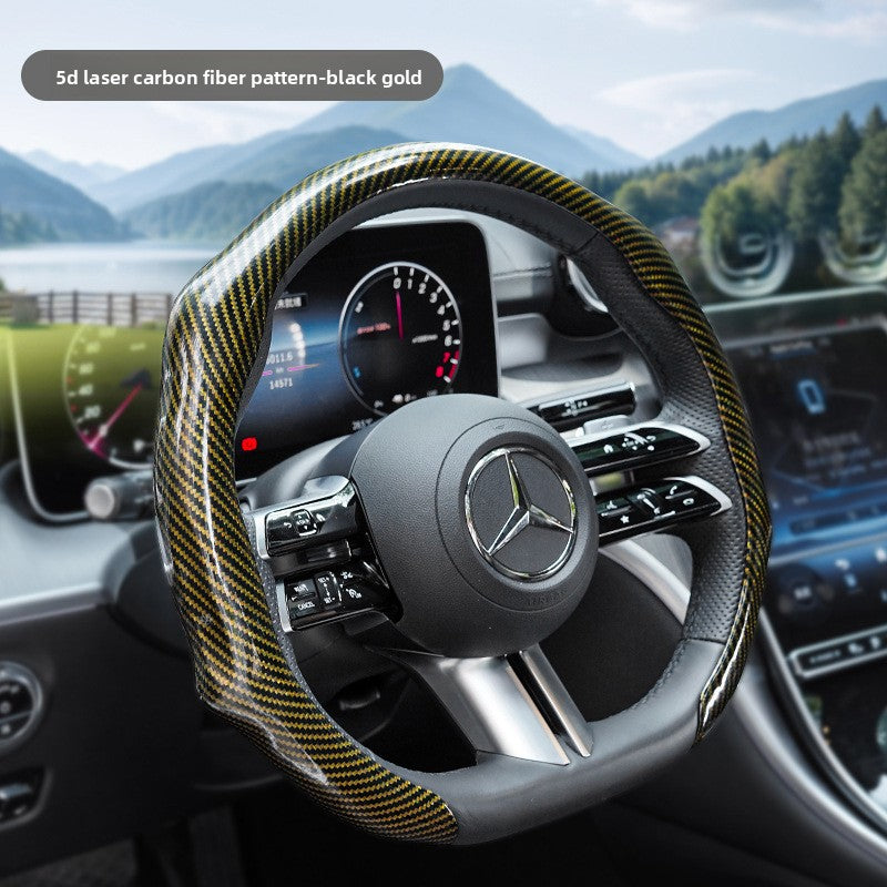 Black gold steering wheel cover fitted on a car wheel