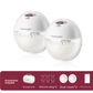 Two wearable breast pumps above a maker accessory panel with case, plugs and covers