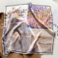 Lavender landscape oil painting printed square scarf with a satin sheen and hemmed edges, shown displayed