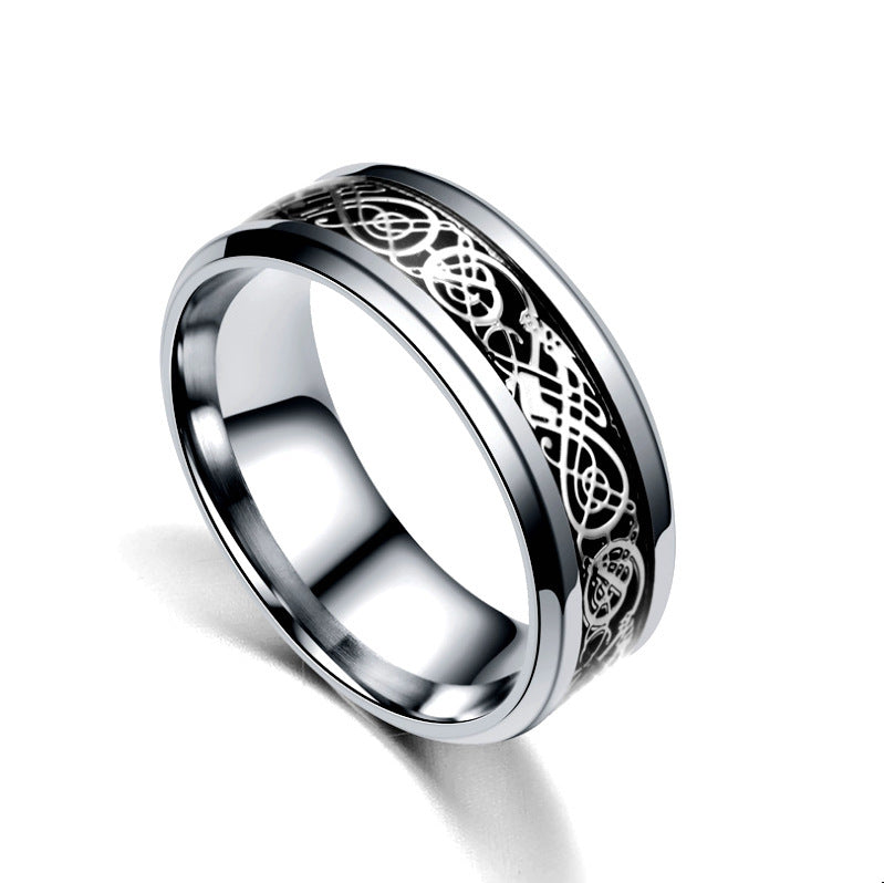 Side angle of the dragon ring showing band thickness and inlay strip