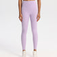 High-waisted nylon and spandex yoga leggings for women, shown on a studio model
