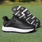 Black golf shoe with a twist dial closure and a spiked outsole with star shaped cleats