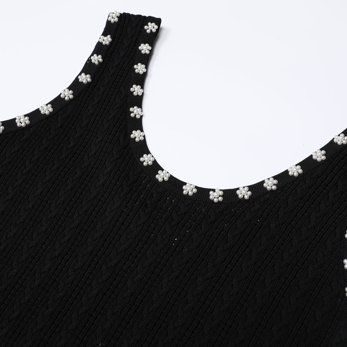 Knitted sleeveless dress shown on the figure for fit reference