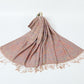 Camel paisley jacquard scarf spread on a white background with twisted camel tassel fringe