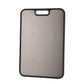Double-sided titanium and wheat-straw cutting board resting flat on a worktop