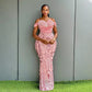 Pink sequin mermaid gown flaring below the knee to the floor