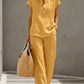 Close up of the linen-look fabric texture on the top and pants set