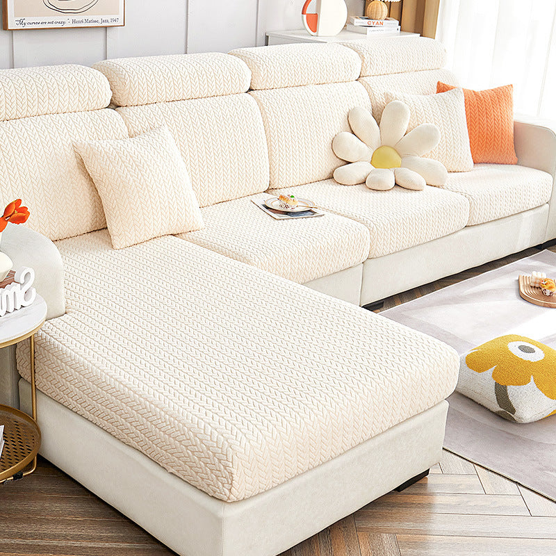 Jacquard sofa cushion cover shown with its packaging and included pieces