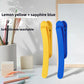 Two piece set of silicone bookmark clips in lemon yellow and sapphire blue on a desk