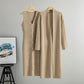Khaki ribbed knit dress and matching long cardigan displayed together on wooden hangers