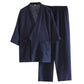 Navy kimono style cotton gauze pajama set with wrap top, side tie, patch pocket and full length pants
