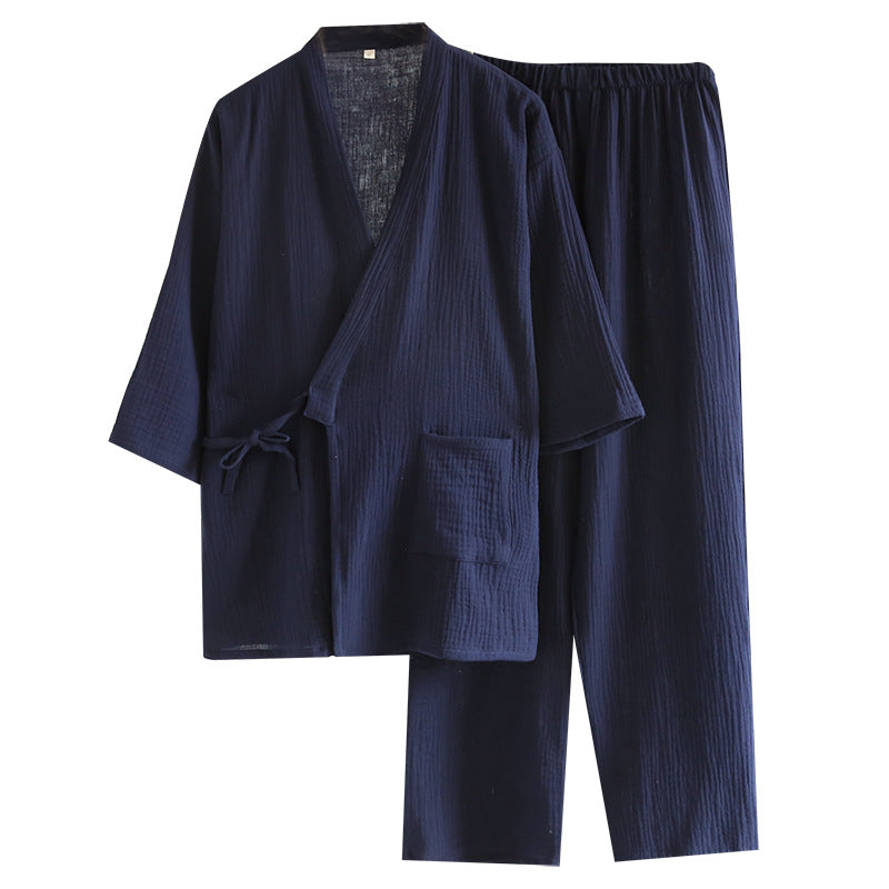 Navy kimono style cotton gauze pajama set with wrap top, side tie, patch pocket and full length pants