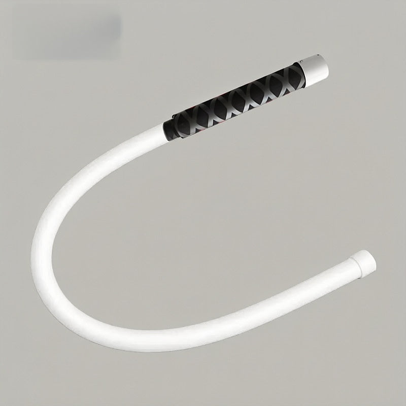 Bendable LED work light held in the hand showing the flexible glowing rod