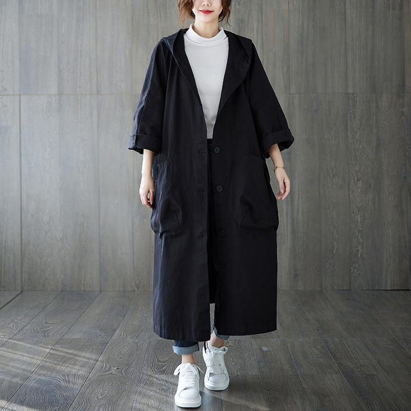 Straight cut oversized coat with attached hood and dropped shoulder seams