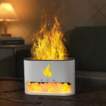 White flame effect aroma diffuser with warm glowing mist and a lit salt rock tray