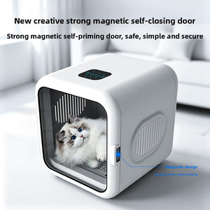 Cat resting inside the white pet drying box beside its magnetic self-closing tinted door