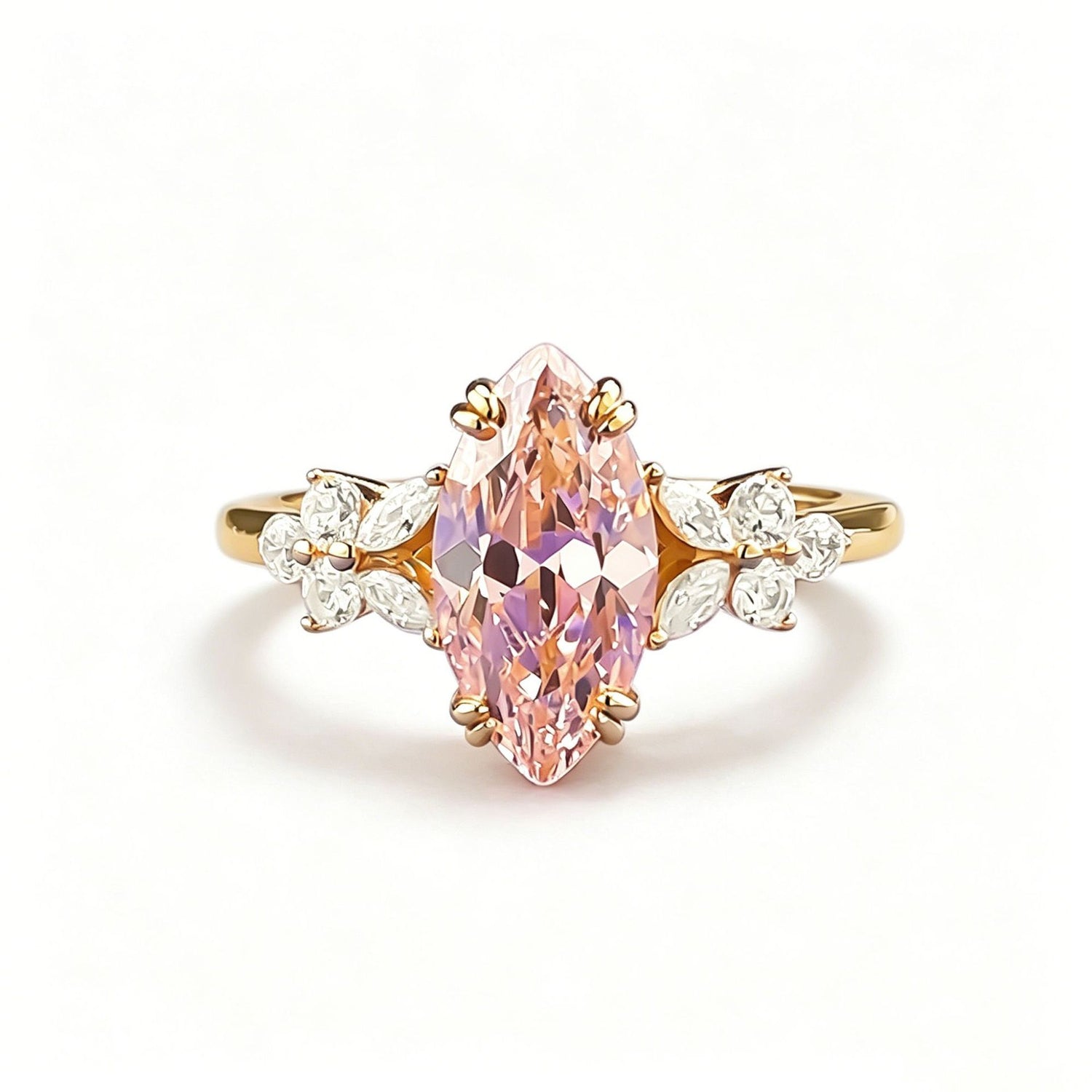 Studio macro on white, 6mm by 12mm marquise simulated padparadscha stone and clear side clusters