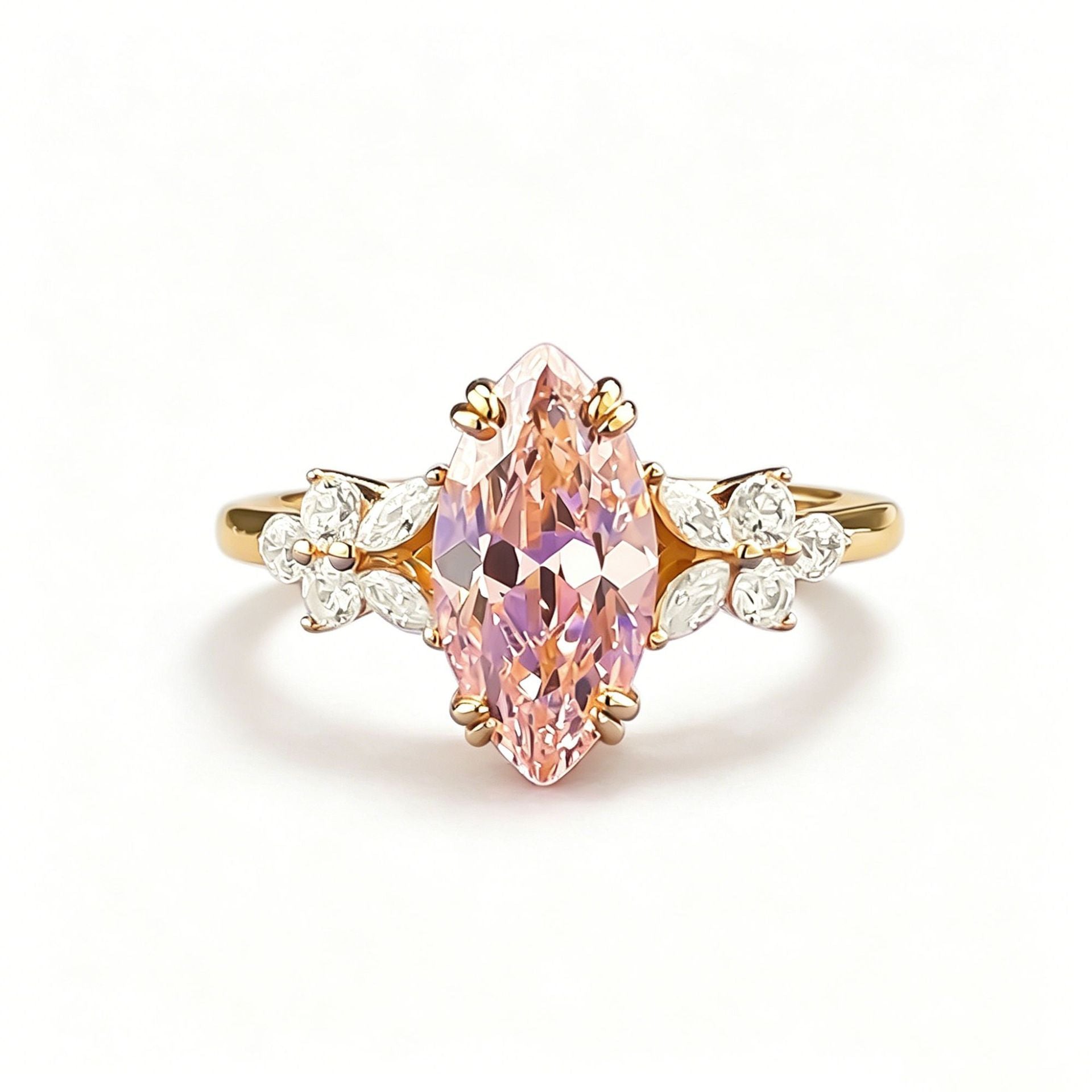 Studio macro on white, 6mm by 12mm marquise simulated padparadscha stone and clear side clusters