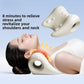 Woman lying back with her neck resting on an ivory contoured foam pillow that has a round opening