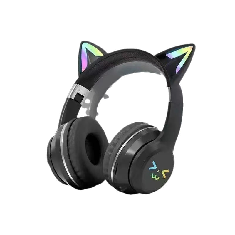 Black cat ear Bluetooth headphones with glowing ear tips and a cat face on the cup