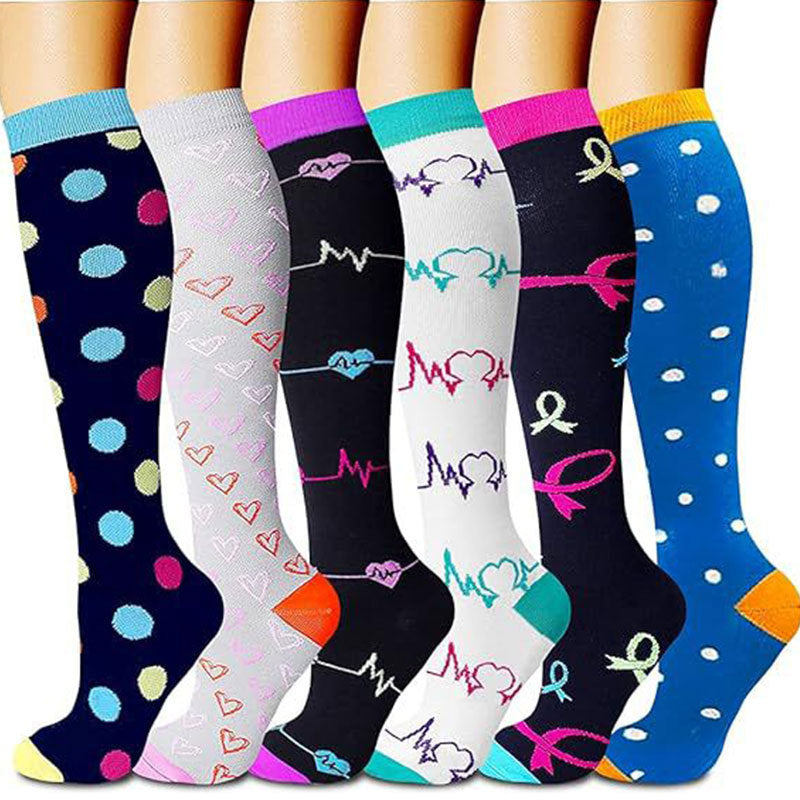 Six knee-high compression socks in polka dot, heart and ribbon patterns