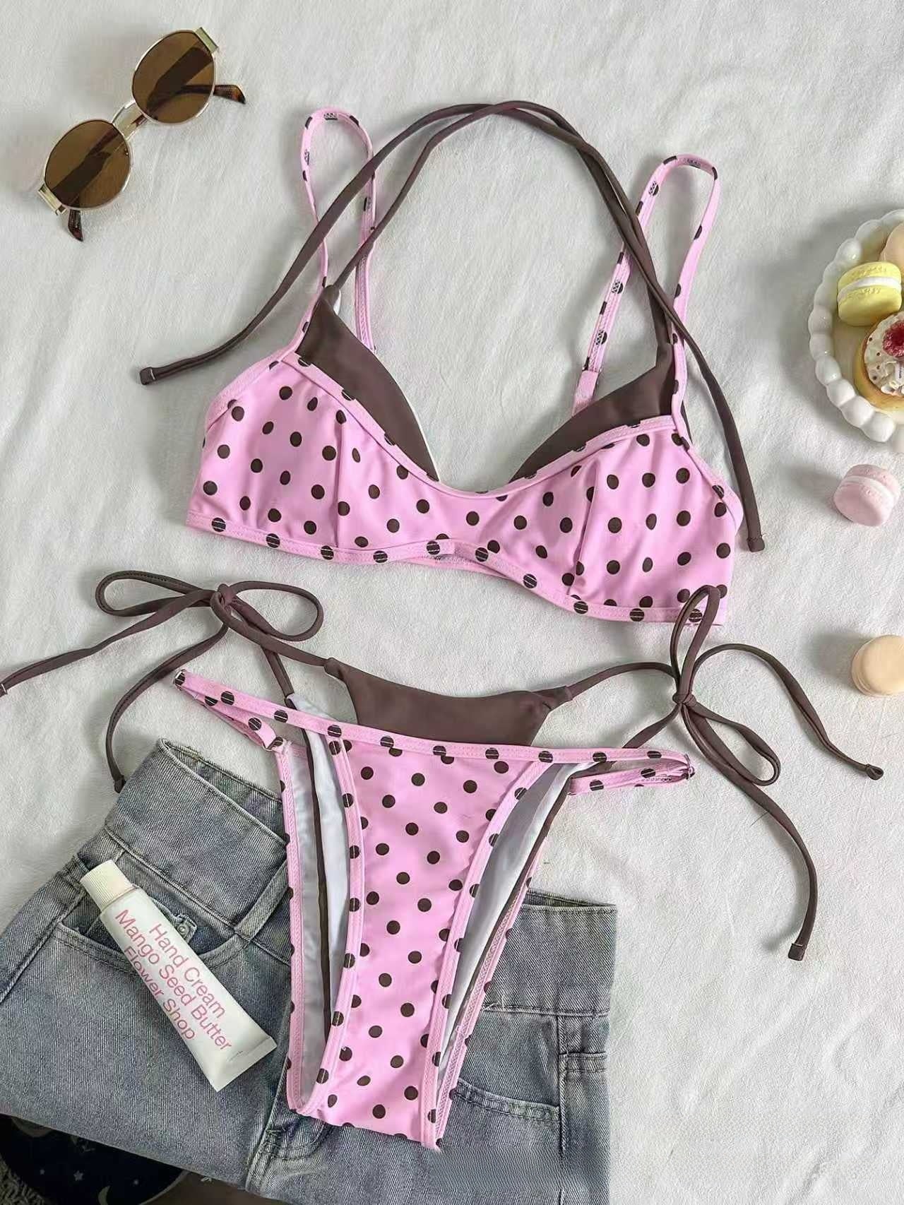Sky blue polka dot bikini flat lay, adjustable straps and neck tie above the tie side brief