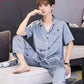 Man checking phone while wearing the pajamas