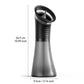 Electric ear irrigation flusher held in hand to show its compact travel friendly size