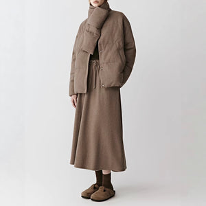 Padded duck down jacket with wool blend shell and stand scarf collar, styled on a model in brown