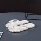 Navy blue folding flip flops with thong loop strap on a light floor