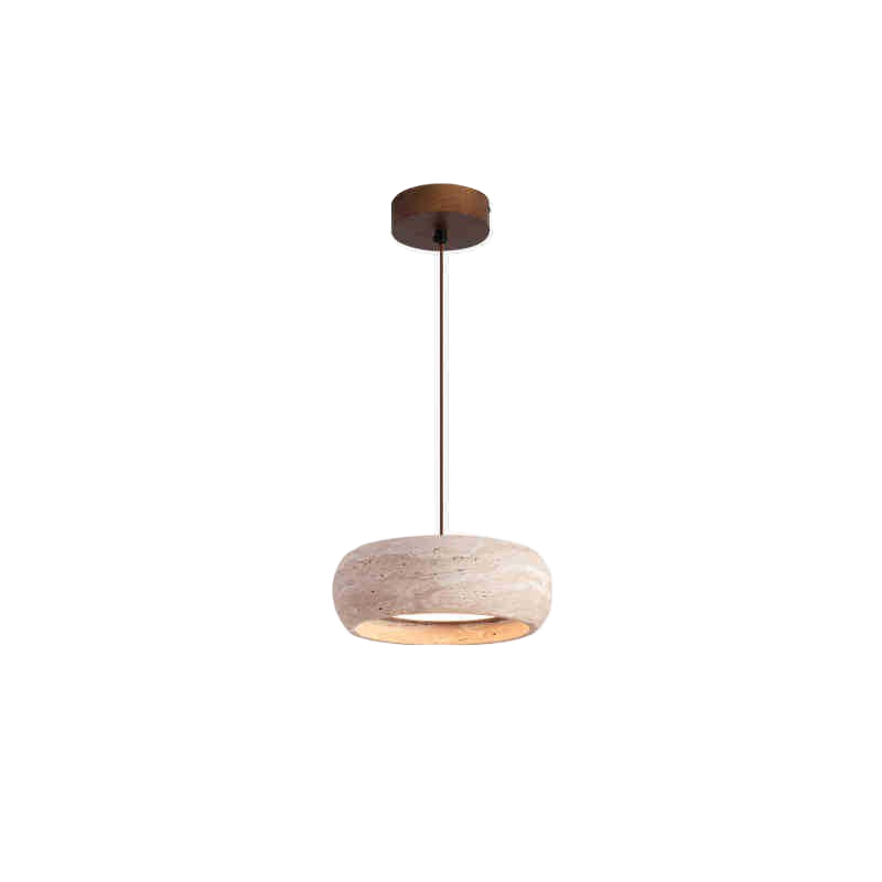 Natural travertine pendant shade casting up and down light against a calm neutral wall