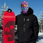 Snowboarder holding a red skull snowboard while wearing the purple monster print balaclava