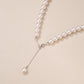Close-up of the polished S925 sterling silver round bead and white gold tone chain links