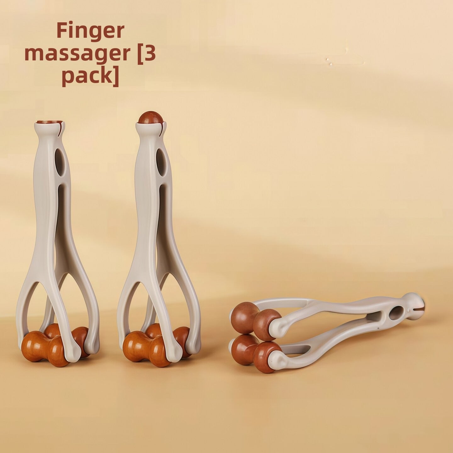 Natural wood grain visible on the smooth beads of the finger massage roller