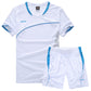 White training kit flat lay with blue collar trim and side panels on the shorts